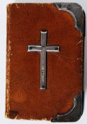 A hallmarked sterling silver Book Of Common Prayer, with silver crucifix to front and hallmarked