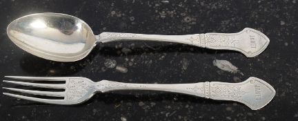 A Victorian sterling silver fork and spoon set with chased decoration to body and dedication to ~