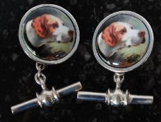 A pair of white silver metal (stamped 925) and enamel set cufflinks, with pictorial of dogs.