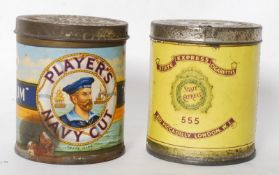 A vintage State express cigarette tin together with a Players Navy Cut cigarette tin. Both having