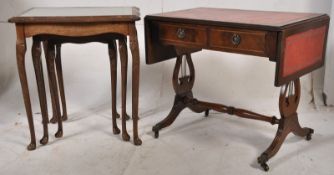 A mahogany and leather nest of tables together with a red leather top drop leaf occasional table in