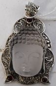 Large silver pendant set with a crystal buddah