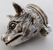 A 20th century silver plated match vesta in the form of a dog / fox. Hinged lid to rear.