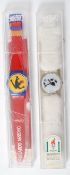 An Eduardo Arroyo cased Swatch watch along with an Atlanta 1996 Frozen Tears cased Swatch watch