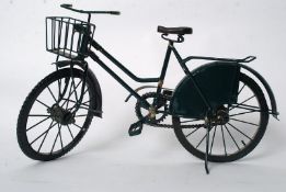 A vintage salesmans style scale model of a ladies bicycle / bike. With miniature chain driven