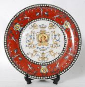 A 19th century Chinese oriental Armourial plate with character mark to base. Bearing handpainted