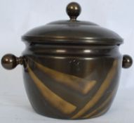 A 1930`s Art Deco polished metal coal bucket. Of large proportions with sunburst effect design