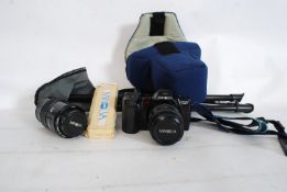 A Minolta Dymax 7000I together with spare Autofocus additional lens, accessories, seat and case etc