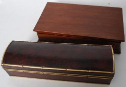 A brass and red morocco leather bound dome top jewellery casket along with a mahogany baize lined