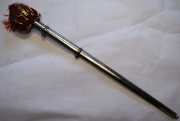 A 20th century reproduction rapier sword with brass handle and original metal scabbard.