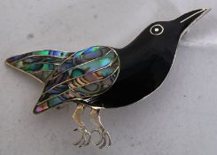 Silver enamel blackbird brooch set with abalone wings