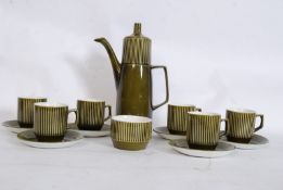 A retro styled Staffordshire Impact green china coffee set, complete with sugar bowl, 6 cups, 6