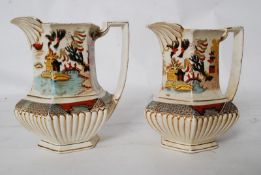 A pair of 19th century hand painted china oriental style jugs with makers mark to base.
