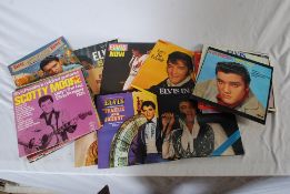RECORDS: A collection of Elvis Presley vinyl records to include The Elvis Tapes, Elvis In Demand,