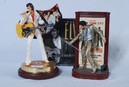 MEMORABILIA: A battery operated Elvis statuette, a McFarlane toys Elvis figure and an 'Images Of