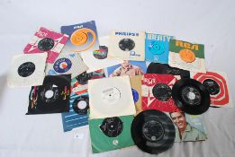 RECORDS: A collection of singles to include Beatles, First pressings, Little Tony, Elvis etc.