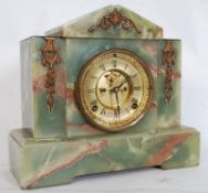 A Victorian Ansonia 8 day movement green marble mantel clock. The open face escapement movement with
