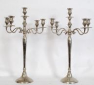 A pair of large silver plate candelabra from Bristol Zoo having shaped stems with central sconce and