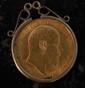 An Edward VII Sovereign dated 1904 set within a 9ct gold hallmarked hoop with clasp