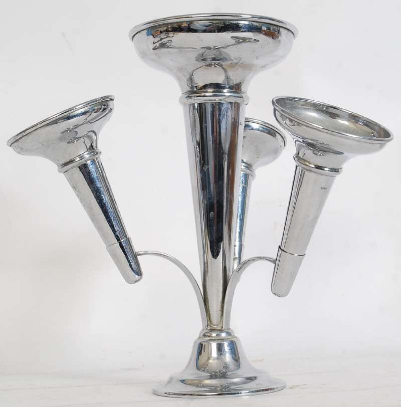 A decorative silver plated epergne being raised on terraced base with central column with 3