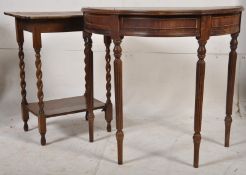 A mahogany and leather demi lune console table. Raised on reeded tapering supports having single