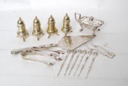 A collection of silver plated items to include salts, cake knife, lobster forks and two sterling