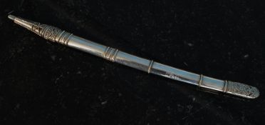 A white silver metal (marked Sterling) letter opener with notation - presented by Commander of the