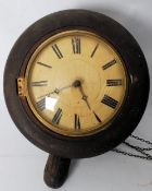 A 19th century postmans clock complete with chain and weights, the movement striking on a bell
