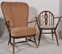 A retro Ercol high back spindle windsor chair being raised on turned supports, Together with an