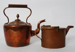 A Victorian copper kettle together with another of unusual form bearing notation to the lid