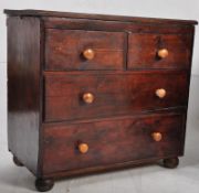 A Victorian pine country cottage 2 over 2 chest of drawers. Raised on bun feet with later handles