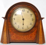 A 1920's Buren swiss made mantel clock with brass movement.
