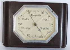 A 1930's Art Deco bakelite wall barometer with glass face and chrome surround.