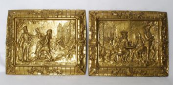 2 brass wall hanging plaques raised in relief depicting traditional scenes