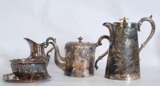 A continental silver plate chocolate pot along with a teapot, milk jug, sugar bowl etc