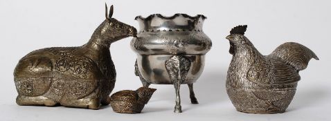 A silver plate urn vase along with two silver plate metal hollow animals and one other.