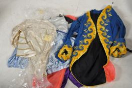 A collection of fancy dress theatrical pantomime drama group costumes, mainly for Aladdin, but could