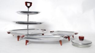 A good 1930's Art Deco silver plate and bakelite 3 tier cake stand together with raised tray and