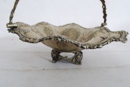 A Victorian silver plated rococo bon bon dish of rococo form stamped for Holland Aldwinkle & Slater