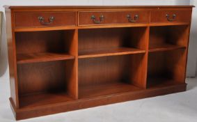 A good antique style mahogany open window low bookcase cabinet. Plinth base with adjustable