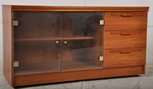A retro teak and smoked glass entertainment sideboard / display cabinet. 63cm x 117cm x 42cm