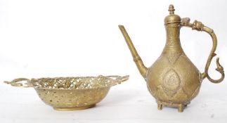 A large heavyweight Indian brass teapot along with a pierce fretwork brass tray.