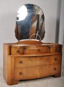A 1940,s Queen Anne revival Art Deco walnut dressing tables / chest of drawers. The breakfront
