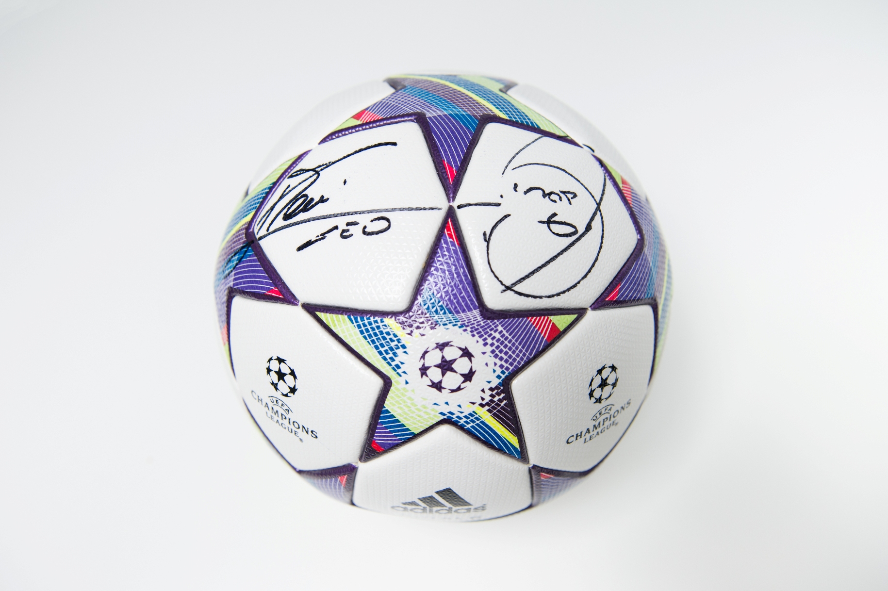 Donated by UEFA. Messi and Xavi signed UEFA Champions League football. This highly collectable  UEFA