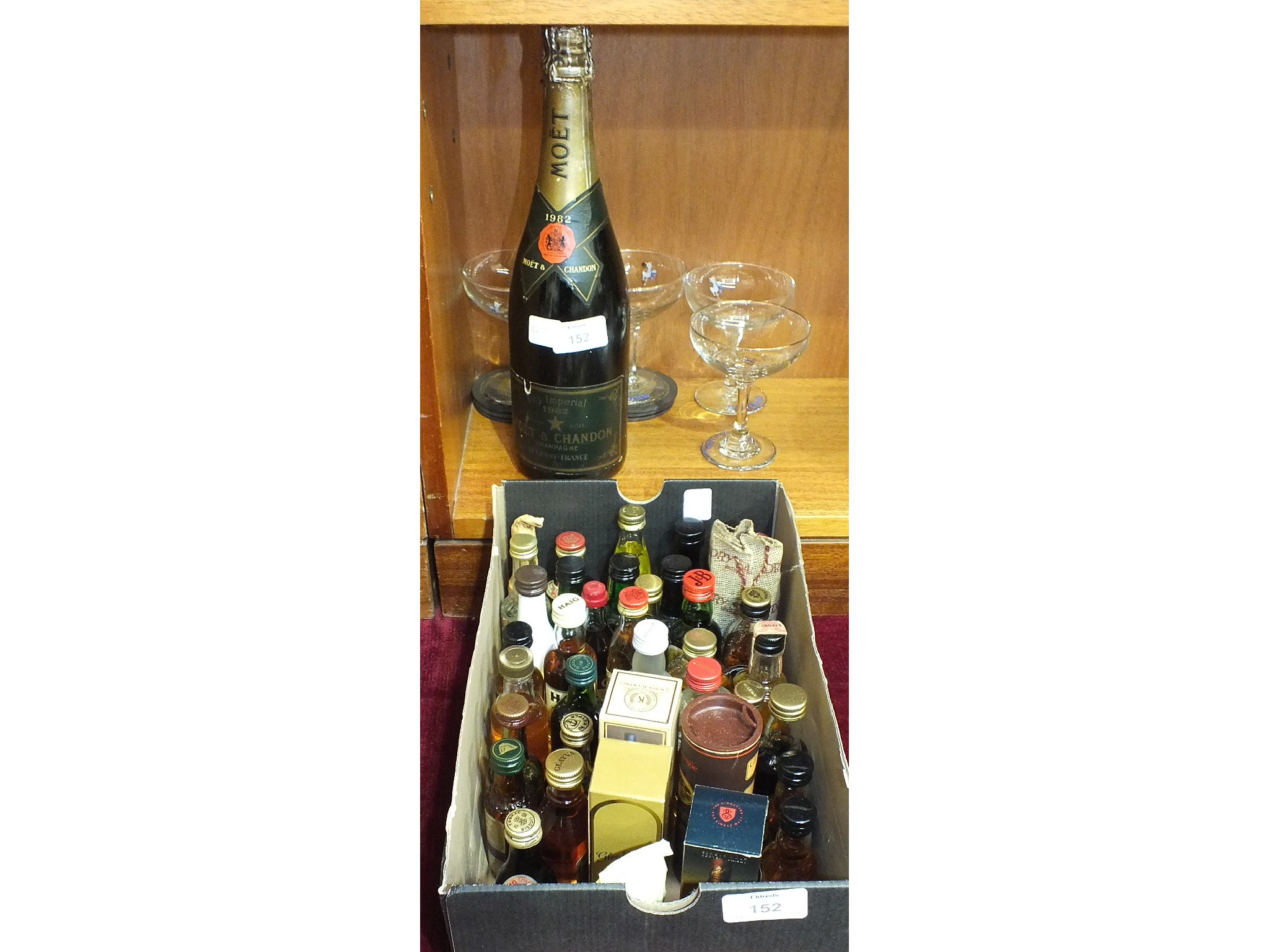 A bottle of Moet et Chandon Dry Imperial Champagne 1982 and a collection of approximately 34