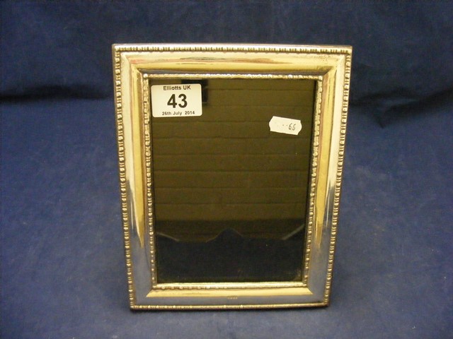 A high grade silver photo frame marked 958