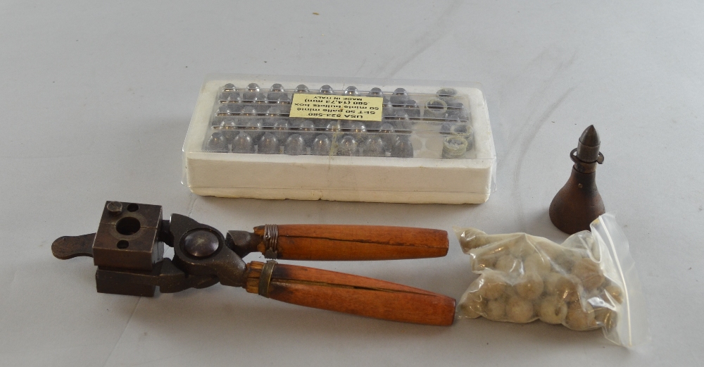 Shot maker, a collection of 18th century style musket balls and set of bullet heads,Bullet mould