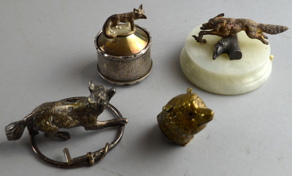 Novely brass vesta in the form of a fox head; silver plated paperweight in the form of a fox;