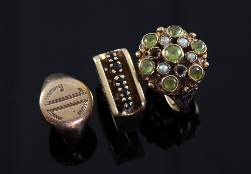 Peridot and pearl set ring, and two other gold ringsTwo seed pearls from peridot missing , otherwise