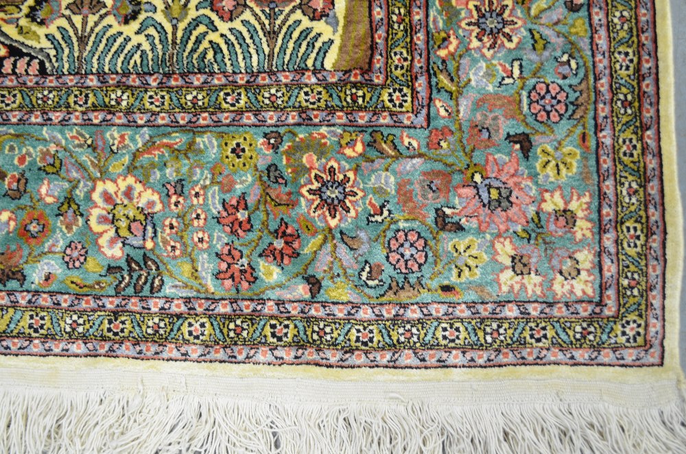 Silk Kashmir cream ground rug with a main green border centre decorated with foliate forms 72 x - Image 3 of 11